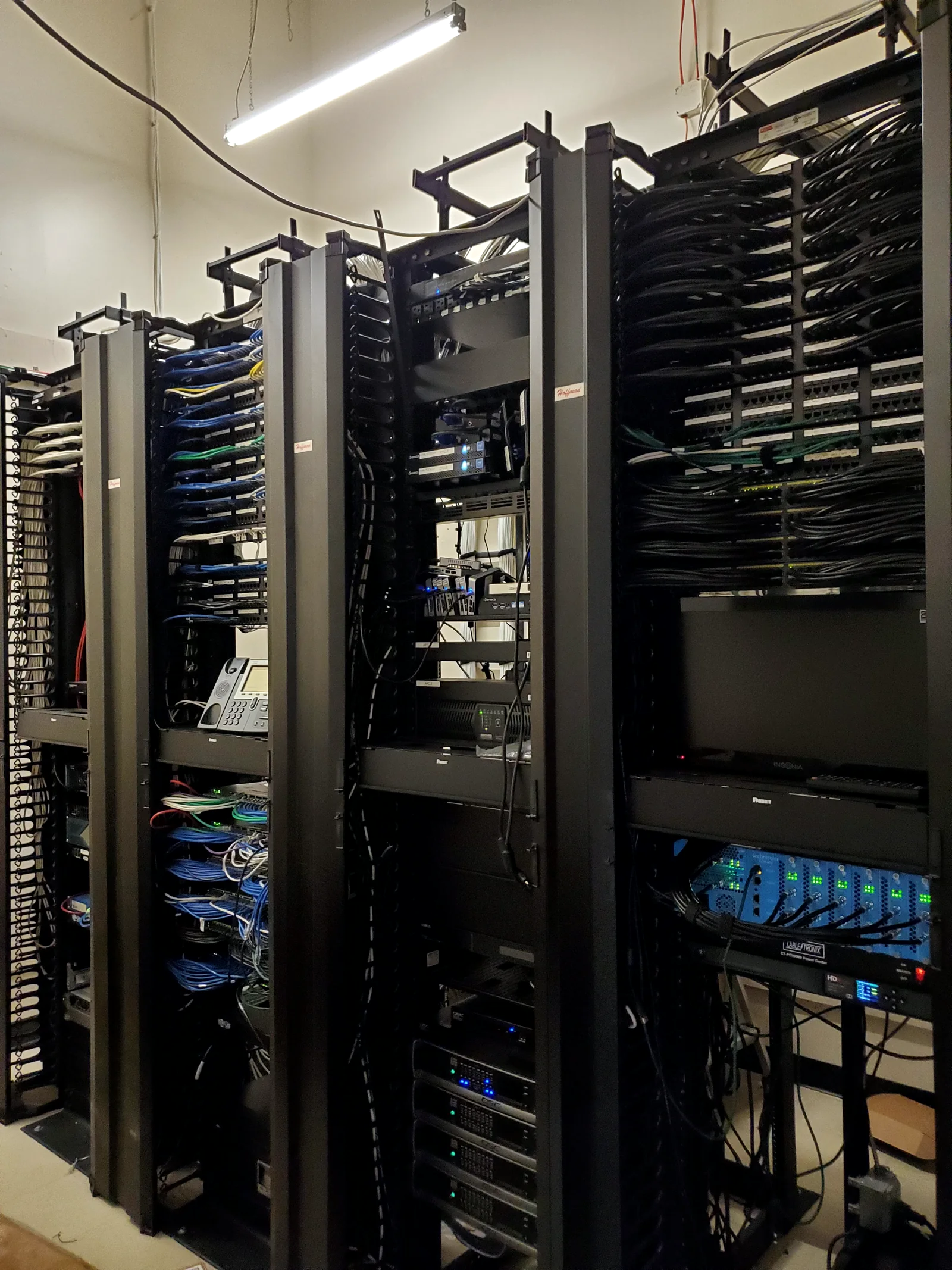 Equipment racks and structured network cabling documented in an LVNET project